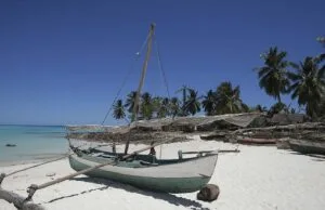 Fishing boat on the beach wallpaper and wall murals shop in South Africa. Wallpaper and wall mural online store with a huge range for sale.