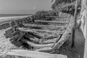 Black and white old wooden boat wallpaper and wall murals shop in California. Wallpaper and wall mural online store with a huge range for sale.