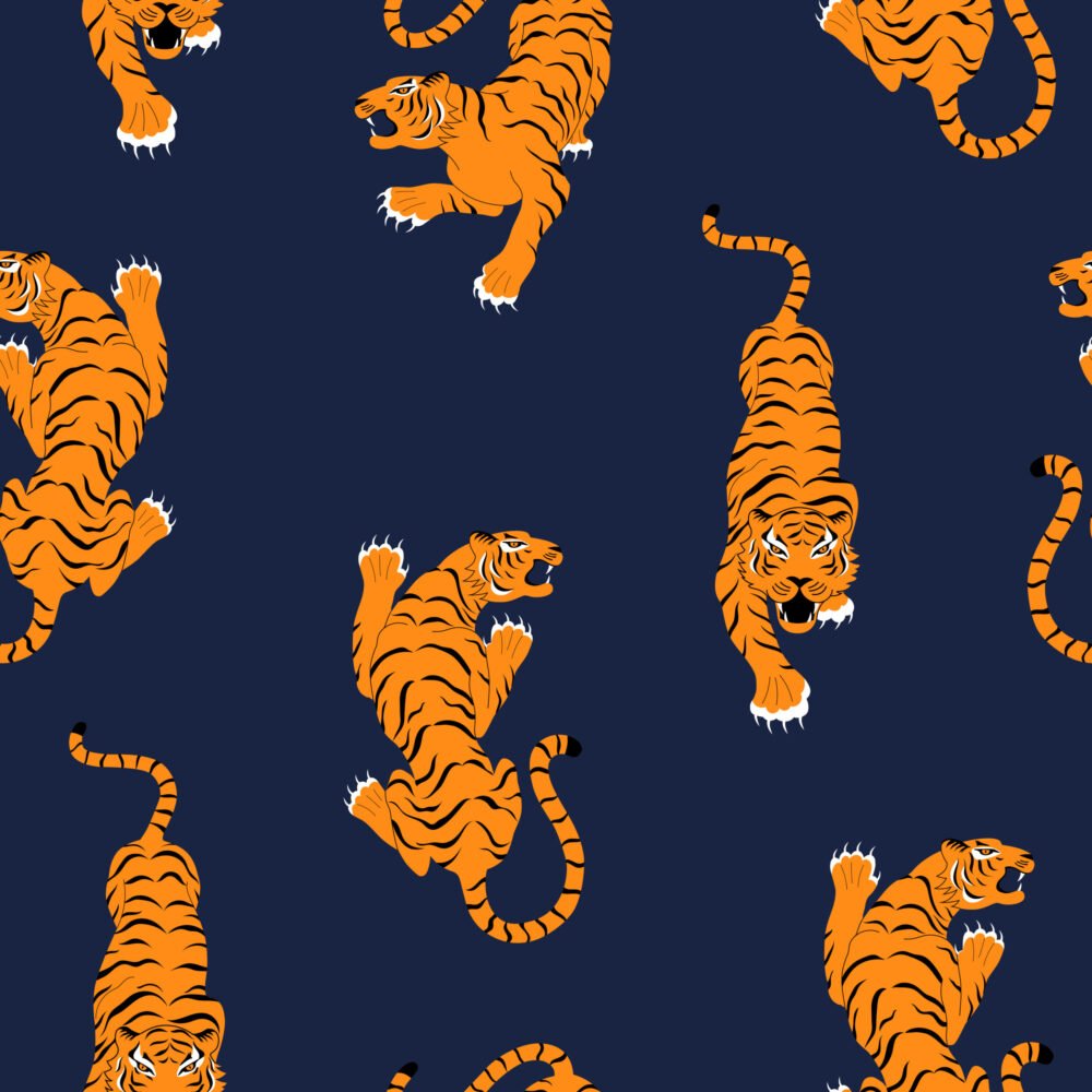 Peel and stick wallpaper of bright orange tigers on a navy blue background.