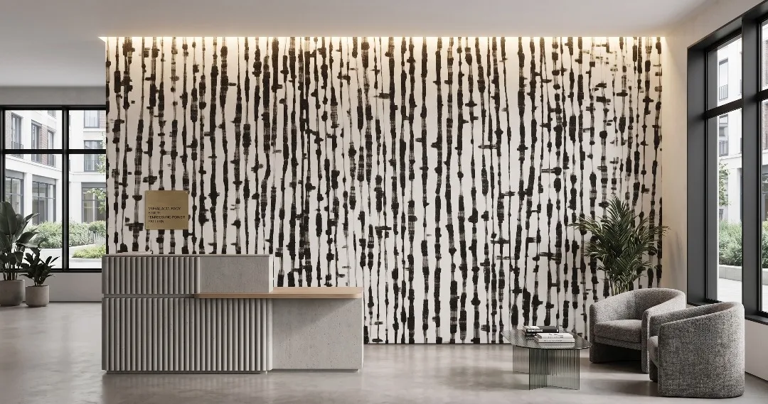 Modern reception area featuring Ink Cascade Mural with expressive vertical black brushstroke lines across a soft ivory background
